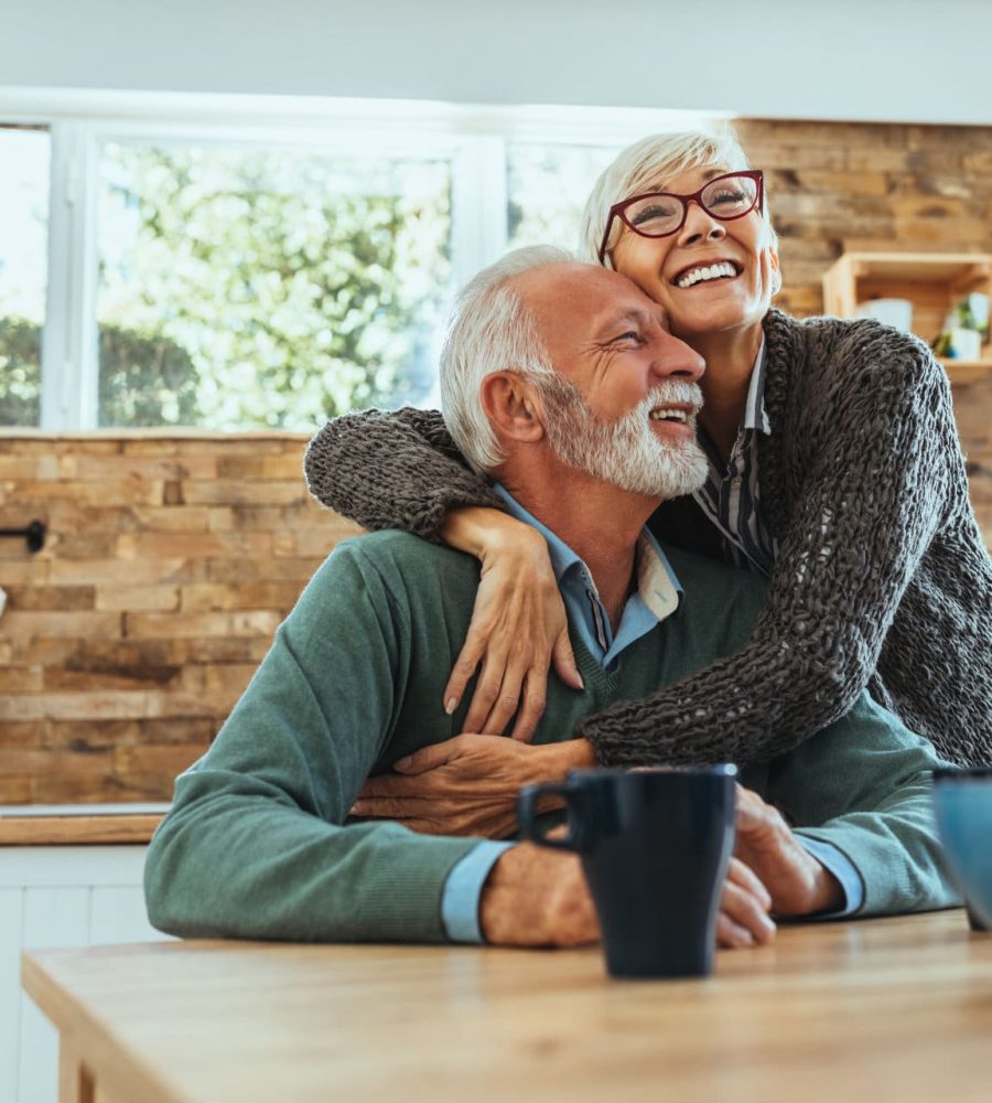 Shot of a mature woman hugging her husband
